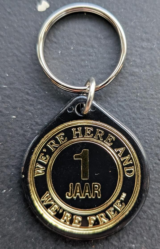 1 jaar plastic coin 