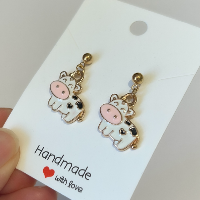 Cow charm earrings