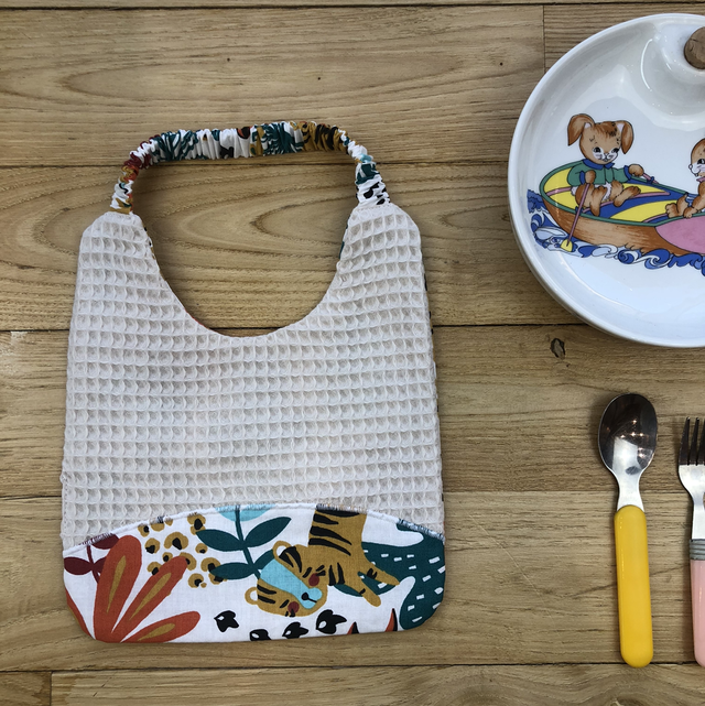 Bavoir écru tropical, à élastique 