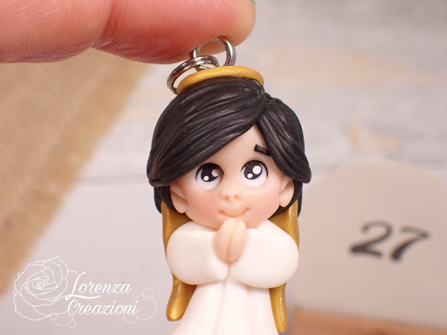 Angioletto custode tascabile n.
27 Portachiavi o charm, artigianale, pezzo unico. Modellato a mano argilla polimerica, made in Italy.