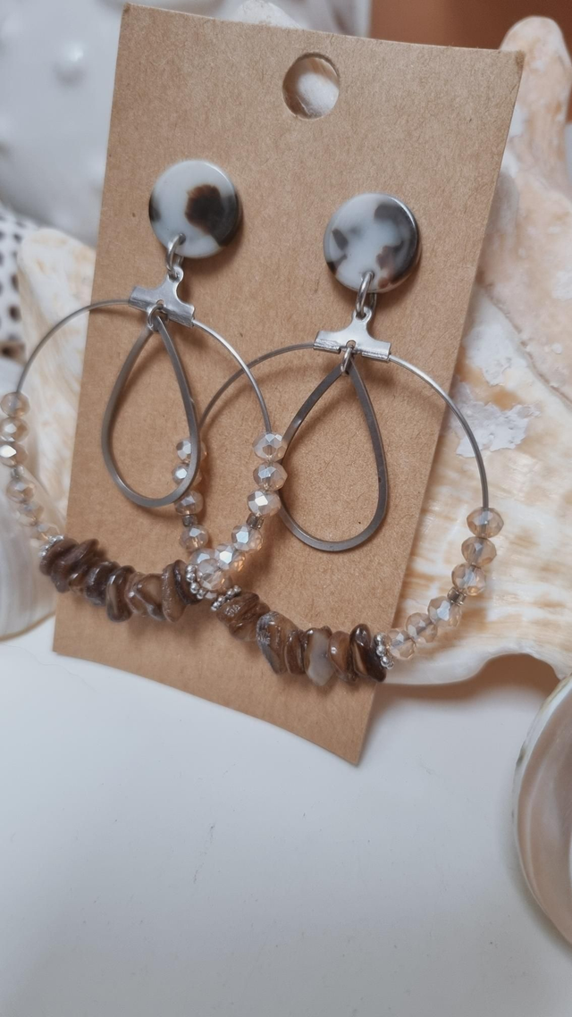 Boucles d'oreilles đ