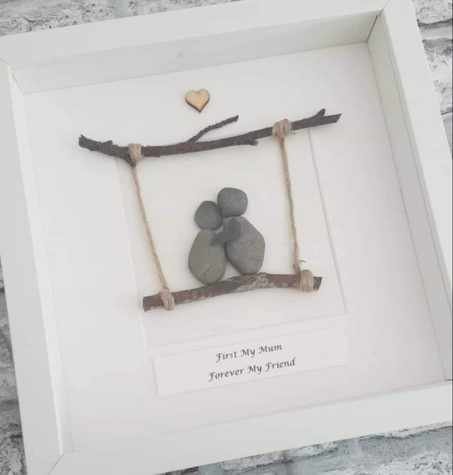 Mother &amp; Daughter on a wooden swing, pebble picture