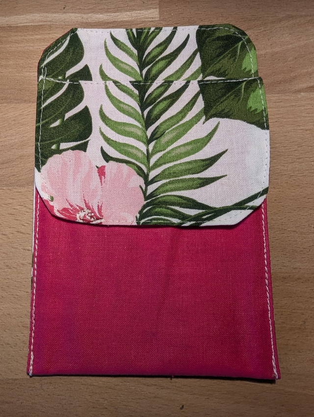 Pochette rose et fleur tropical