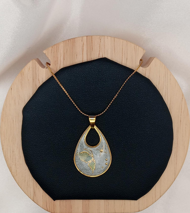 Pendentif papillon étoile