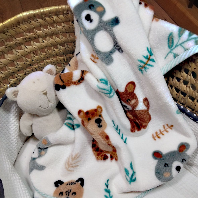 Couverture doudou animaux sur fond écru