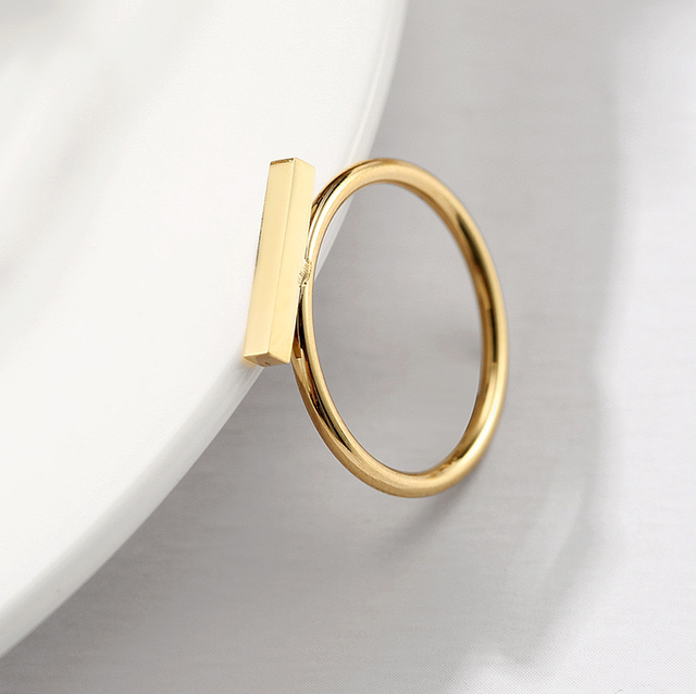 Solid bar gold colored ring(Size 6)