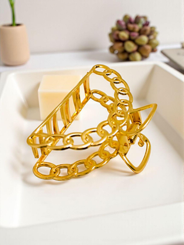 Pince dorée à griffes 