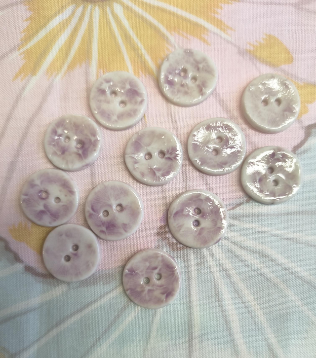 Boutons mauve