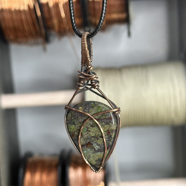 Dragons blood Jasper pure copper wrapped pendant 