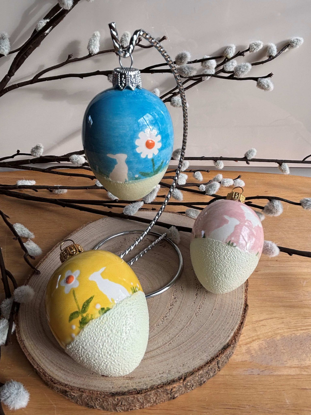 7cm Handmade Egg showing Two Rabbits - choice of blue, pink or yellow