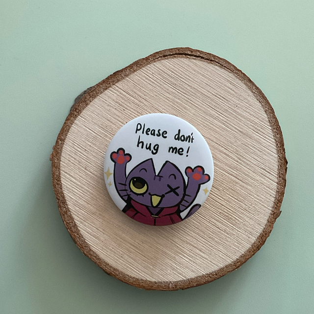 Don't hug me badge ponchocatt