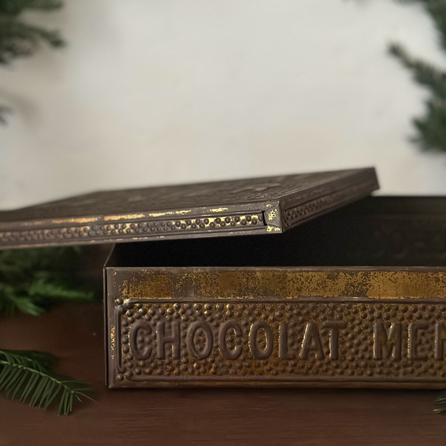 l'ancienne boîte en métal Chocolat Menier