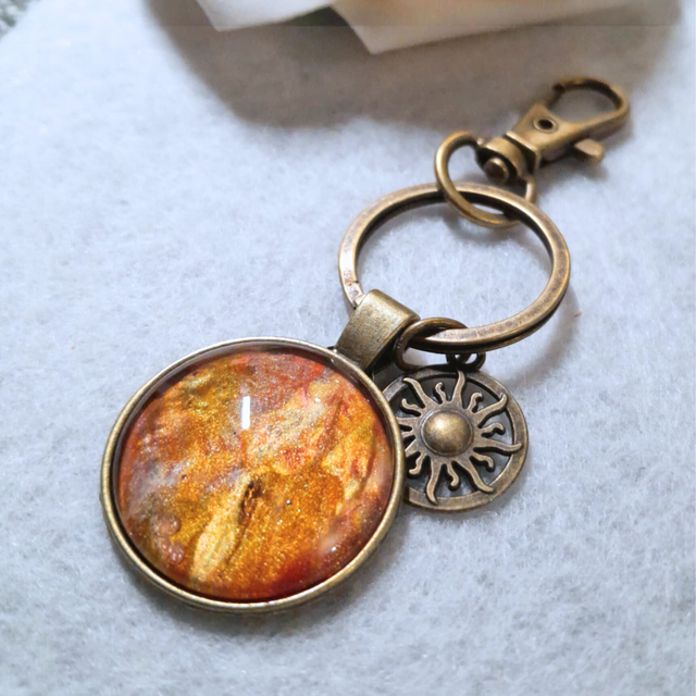 SOLEIL CUIVRE - Bijou de sac - Bronze ancien 