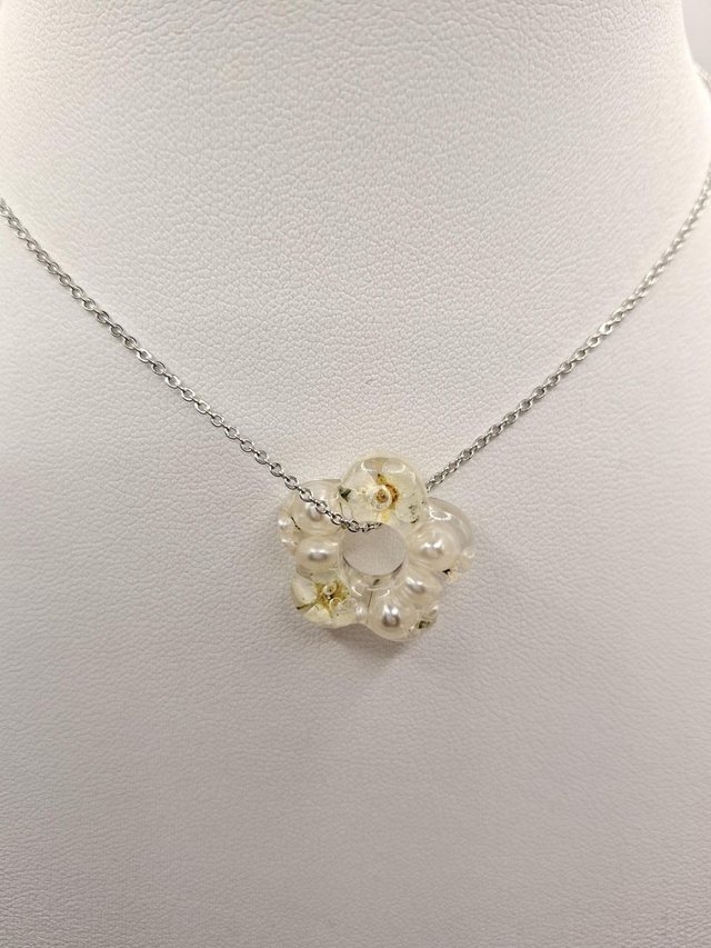White flower and pearl necklace