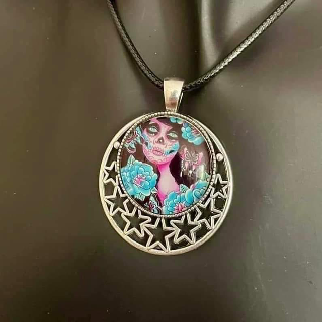 Glass pendant on 17”-19” black cord