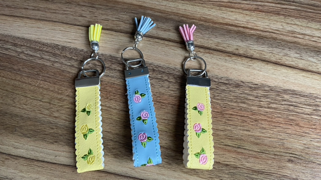 Embroidered roses with metal key fob