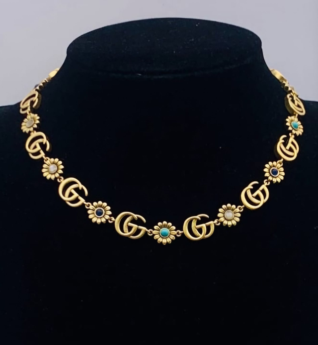 Colliers GC doré design fleur 