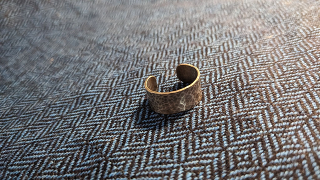 Hammer finished silver ring