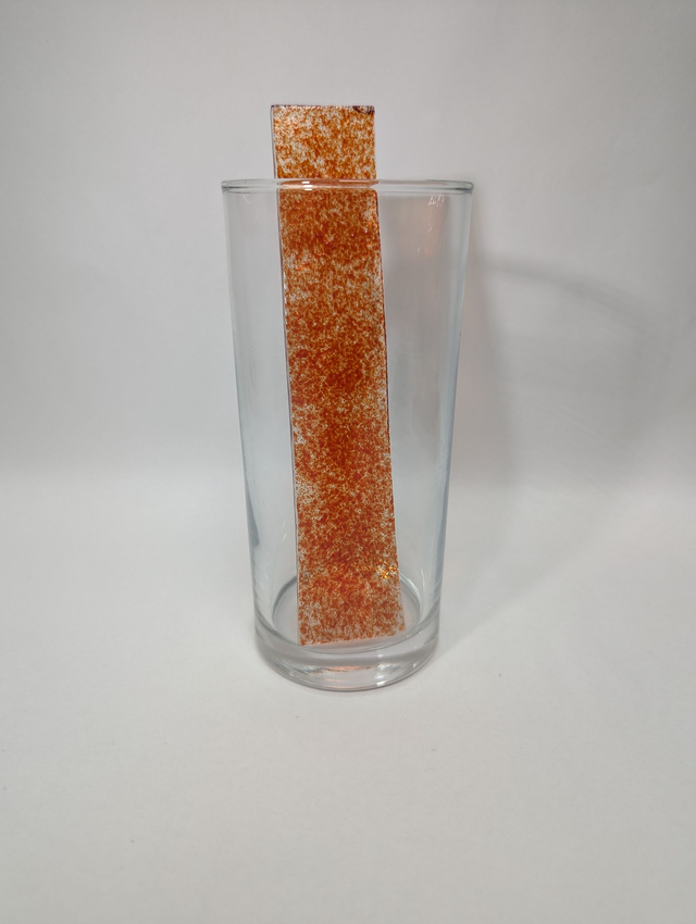 Touillette en poudre de verre rouge