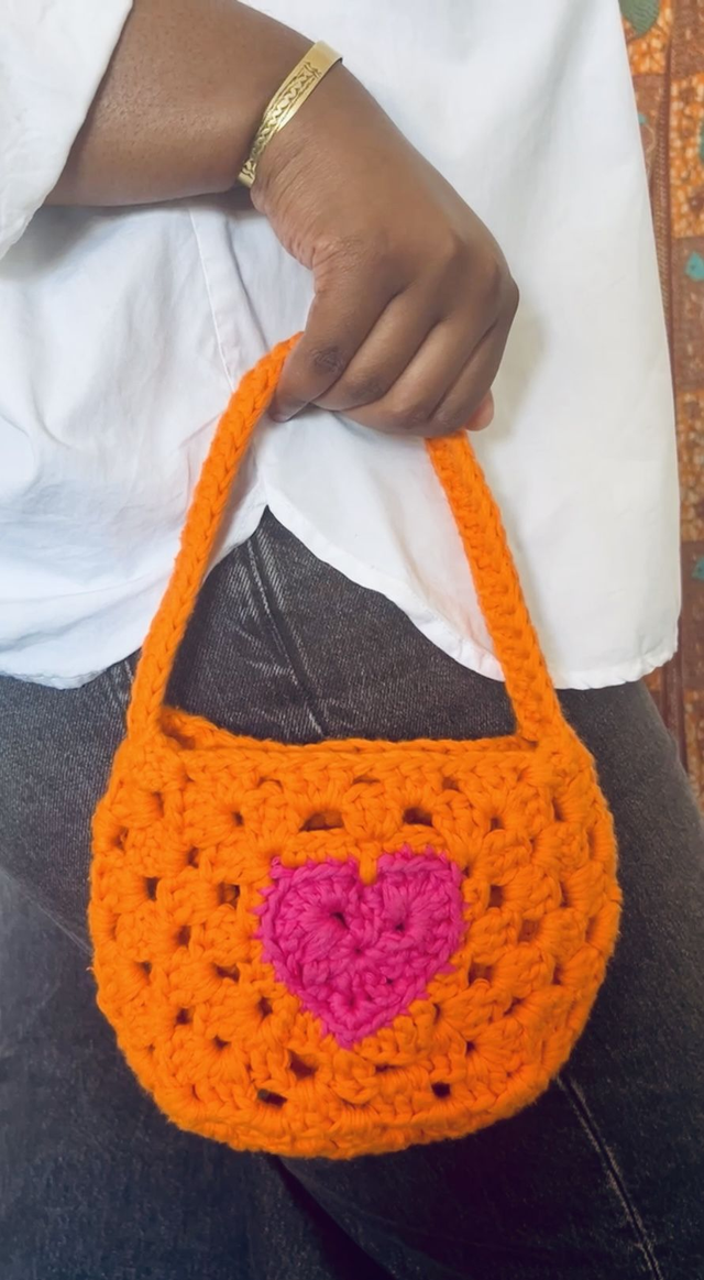 Sac Bourse Akoma, vert et rose fuchsia 