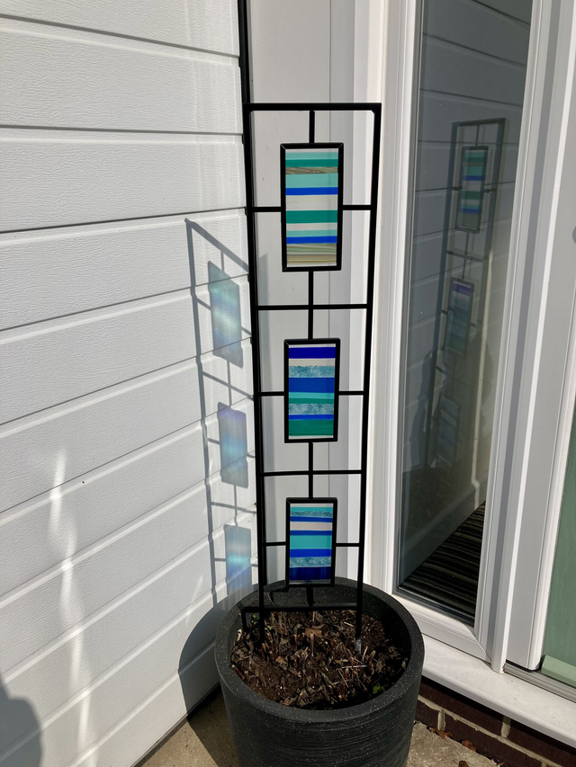Blue horizons garden trellis with fused glass panels