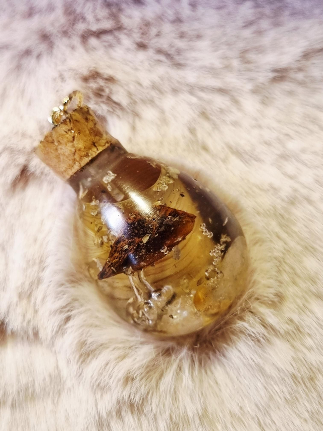 Le Pendentif Potion #56 - Joie