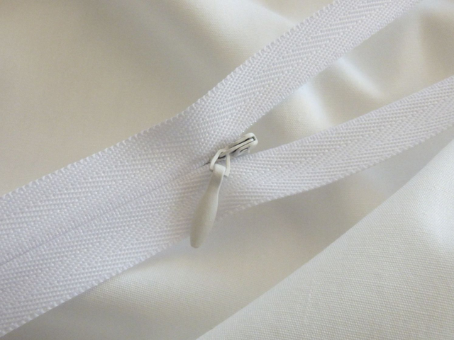 Invisible Blanc - Fermeture Eclair