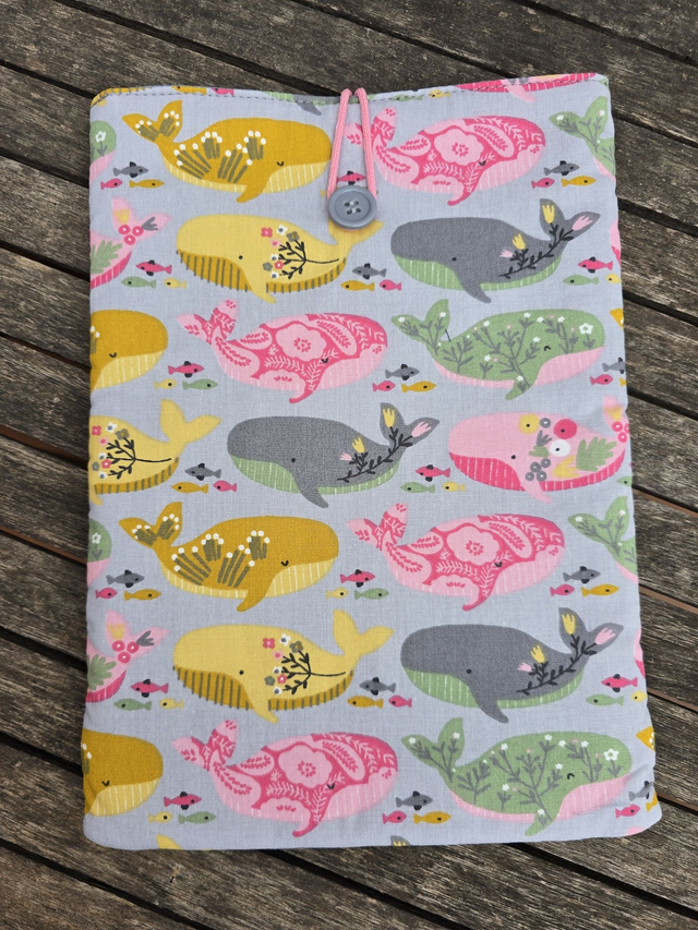 Funda de libro de ballenas de colores 