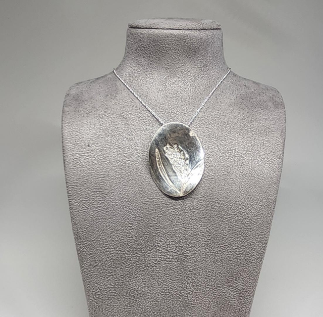 Lavender imprinted pendant on silver necklace