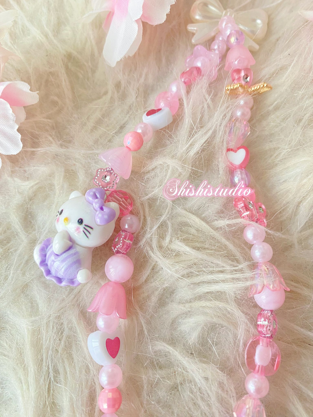 Hello Kitty purple bracelet phone strap
