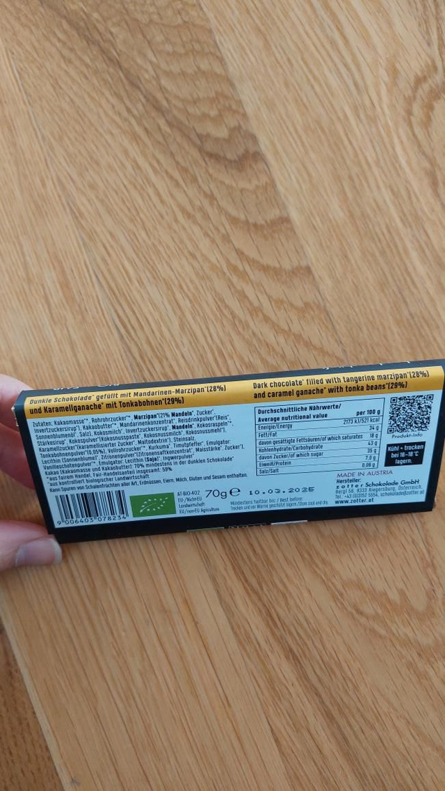 Zotter Tangerine marzipan & tonka bean caramel filled vegan handscooped bar