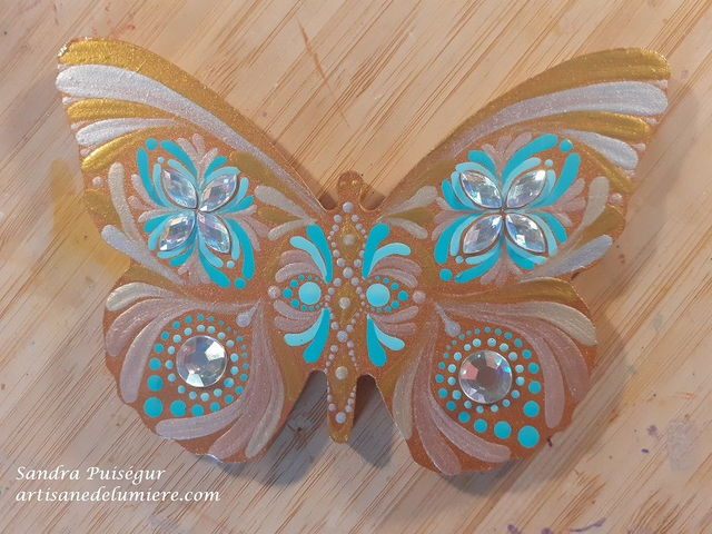 Papillon cuivre, or, argent