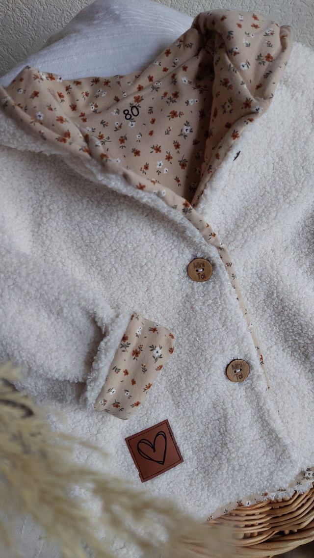 Veste bouclettes 80/86