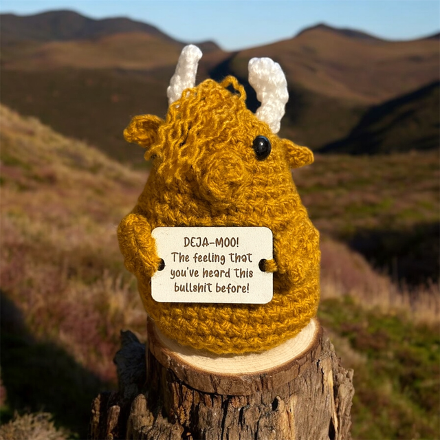 Crocheted positive pal highland coo (Deja Moo)