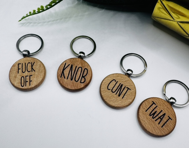 Rude wooden keyring