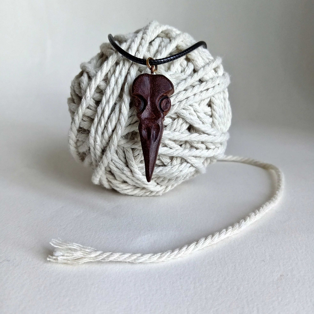 Pendentif crane d'oiseau