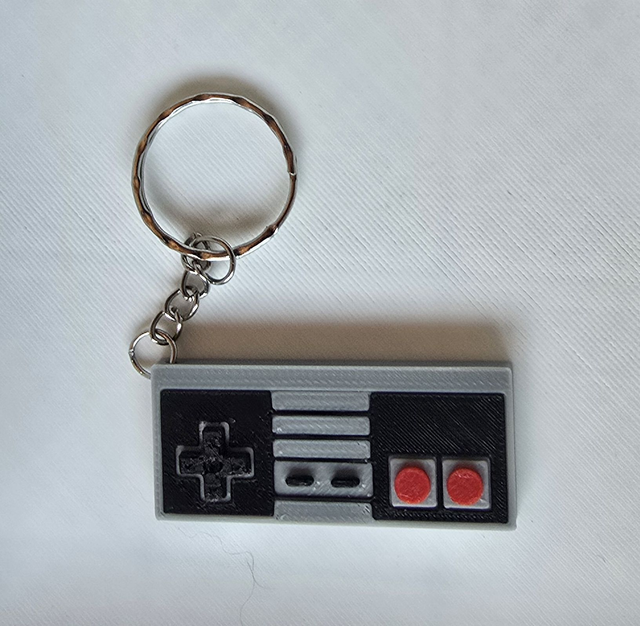Porte clé Manette Nes