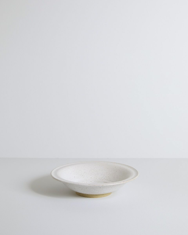 Small white speckled dish