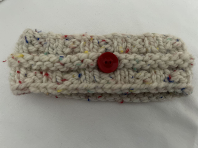 7030. Child's ear warmers