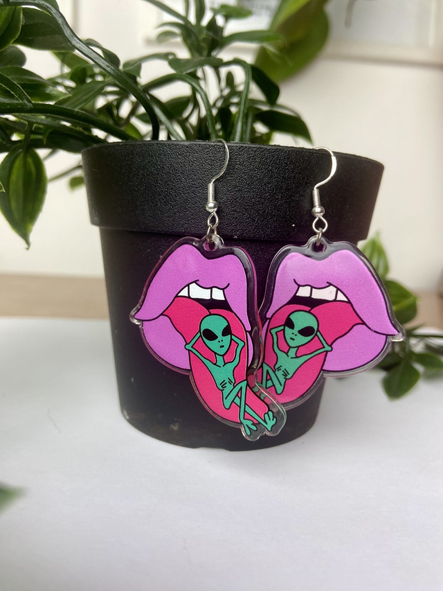 Alien mouth earrings.