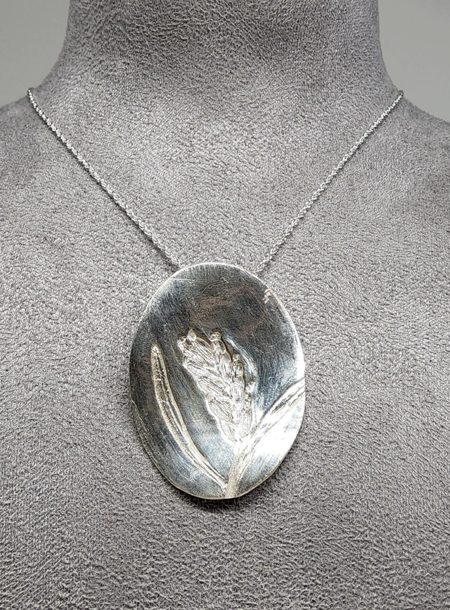 Lavender imprinted pendant on silver necklace