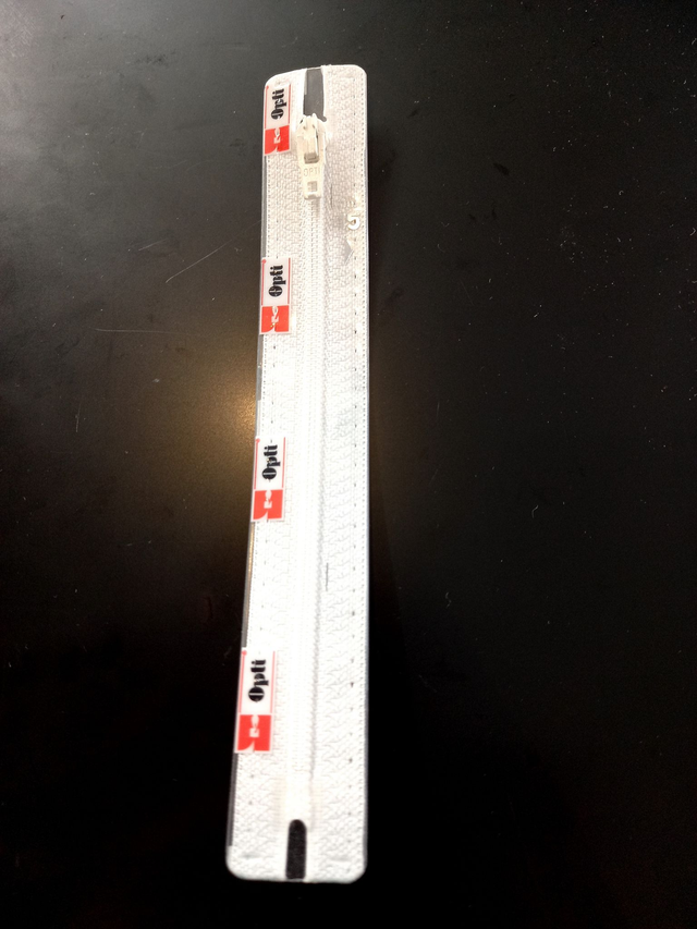 S40 / kleur 89 Opti rits kunststof gebroken wit