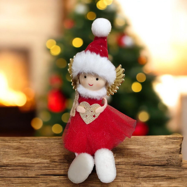 fée de Noël en robe rouge