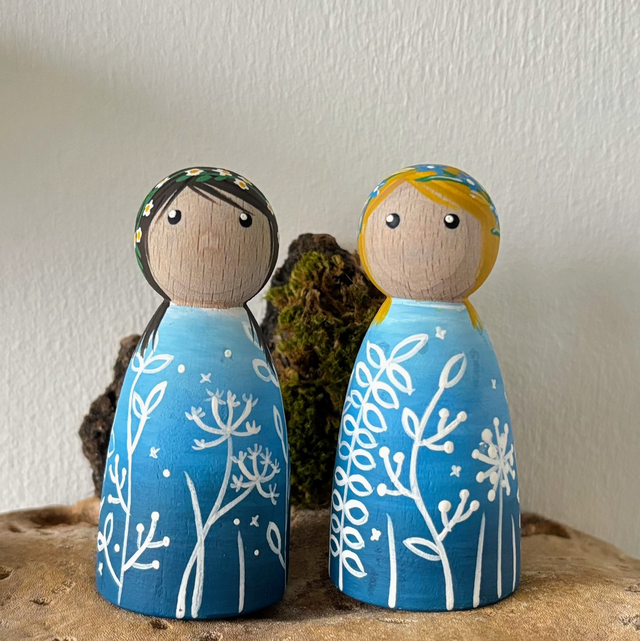 Scandinavian style floral doll dark haired