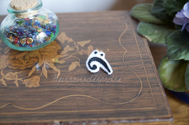 Broche clé de fa