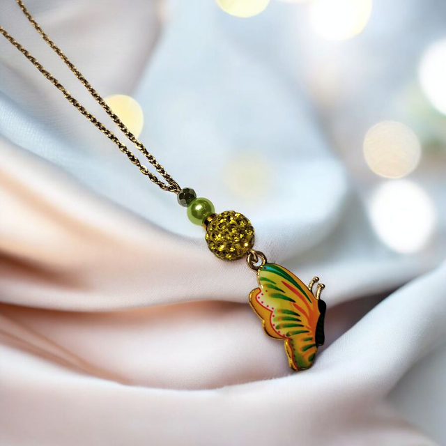 Collier acier inoxydable et cristal jaune et vert papillon