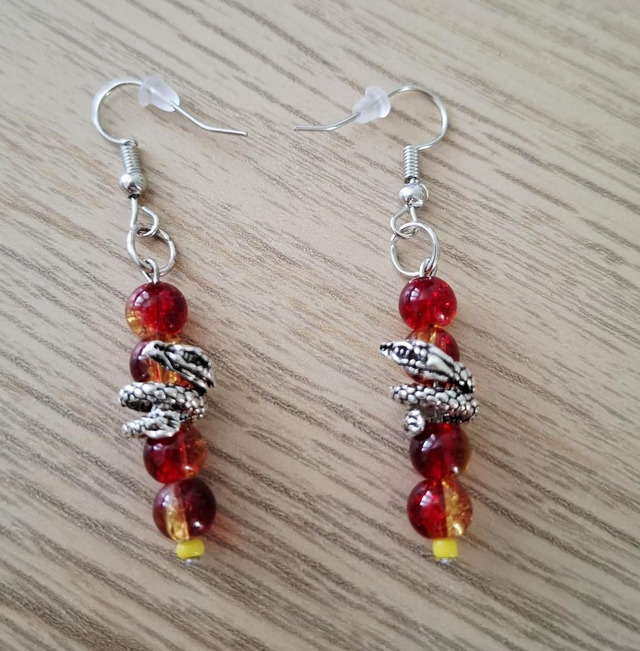 Dragon drop earrings with yellow and red glass beads