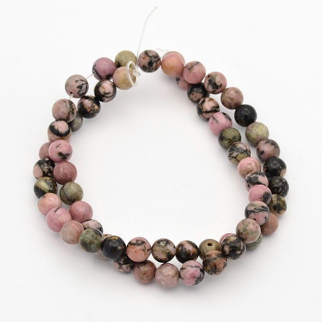 Rhodonite Marbrée perles rondes et polies - A l&#039;unité