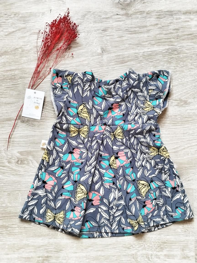 La robe qui tourne à manches courtes sur mesure