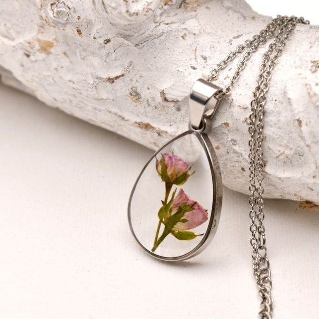 Tiny pink rosebuds in drop pendant